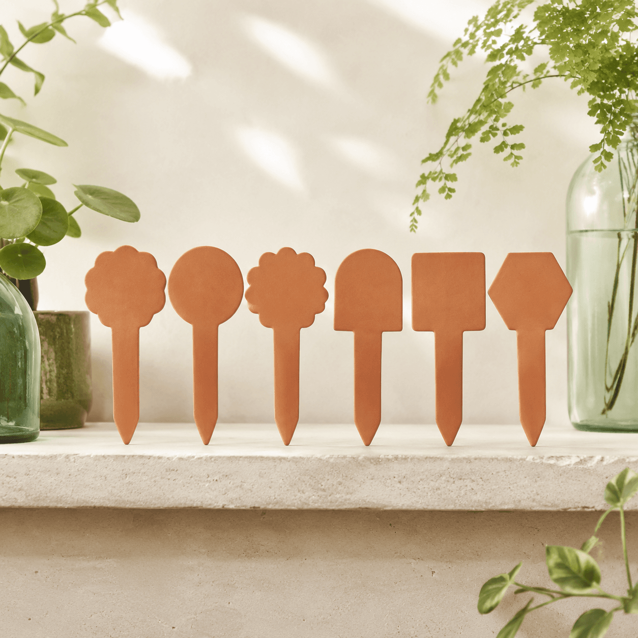 Terracotta Marker Set — Blank clay markers that wipe clean between seasons.